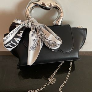 Women’s Silver Handled Mini Clutch Bag
